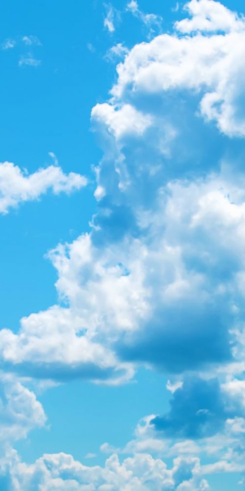 Beautiful blue sky with clouds. Selective focus. Nature.